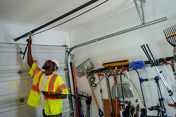 Professional Garage Door Panel Replacement technician working in Santa Fe County County, NM